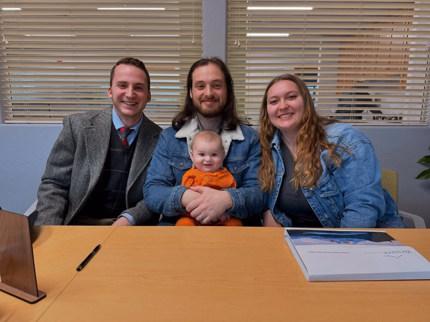 Aaron Cherry with home buyers at closing — buyer representation services in Roseburg, Oregon